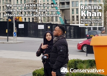 Rahima Khan and a supporter inspecting new homes