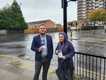 James Clifford and Susan Hall standing at the junction of Plaistow High Street and Clegg Street